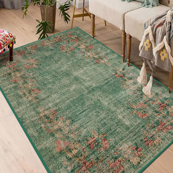 Close-up of Green Antique Look Rug’s intricate patterns and low-profile pile.