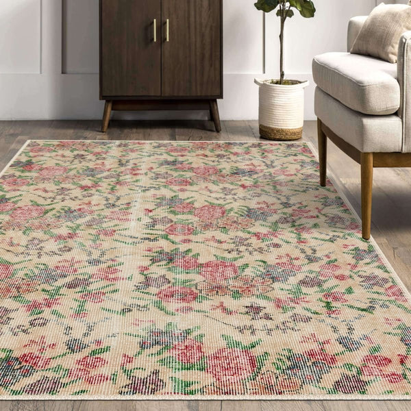 Close-up of Oushak Vintage Style Rug’s faded design and low-profile pile.