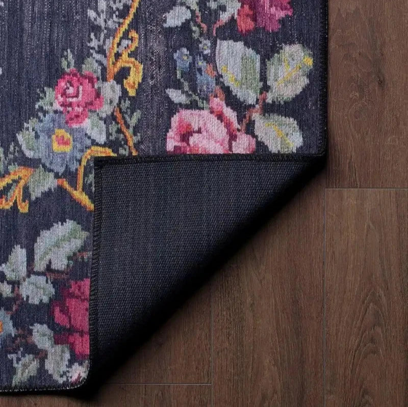 Moldovian Black Rug with traditional patterns in a luxurious living room.