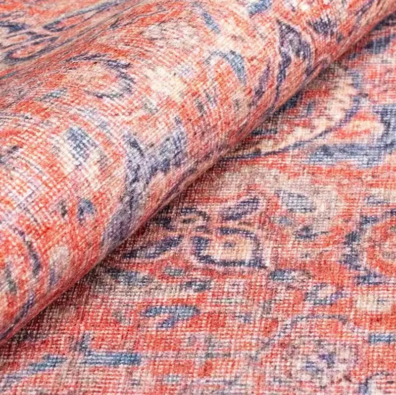 Soft pink Persian rug with elegant patterns in a contemporary living room